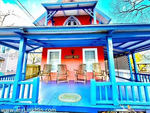 an aerial view of a house with a garden