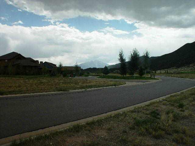 345 Homestead Road Carbondale, CO 81623 - Photo 4 of 5 a view of a lake with a yard