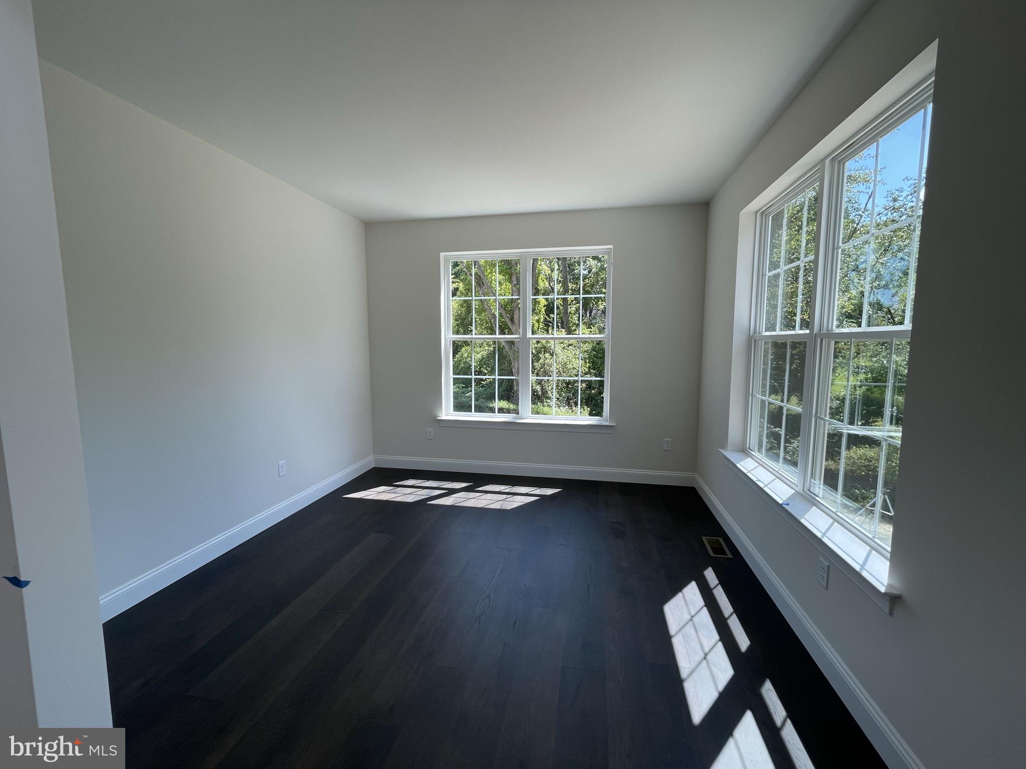10 Hidden Pond Drive Reading, PA 19607 - Photo 7 of 23 a view of an empty room with wooden floor and a window