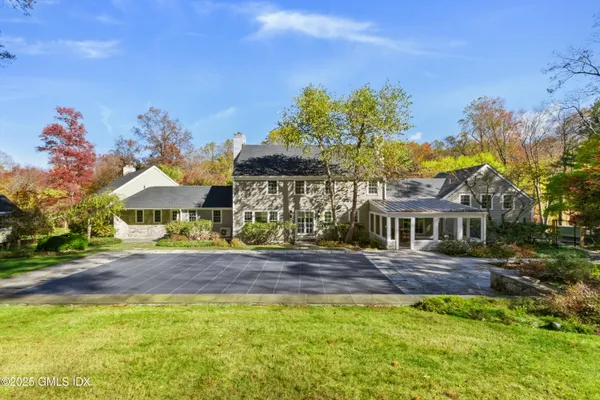 a house with a garden in front of it