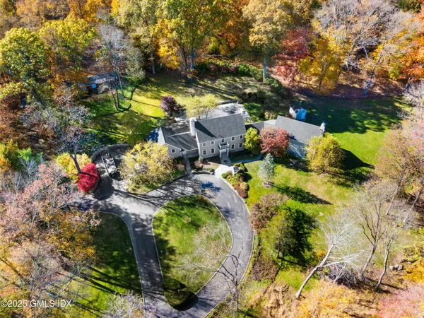 a view of swimming pool with a yard