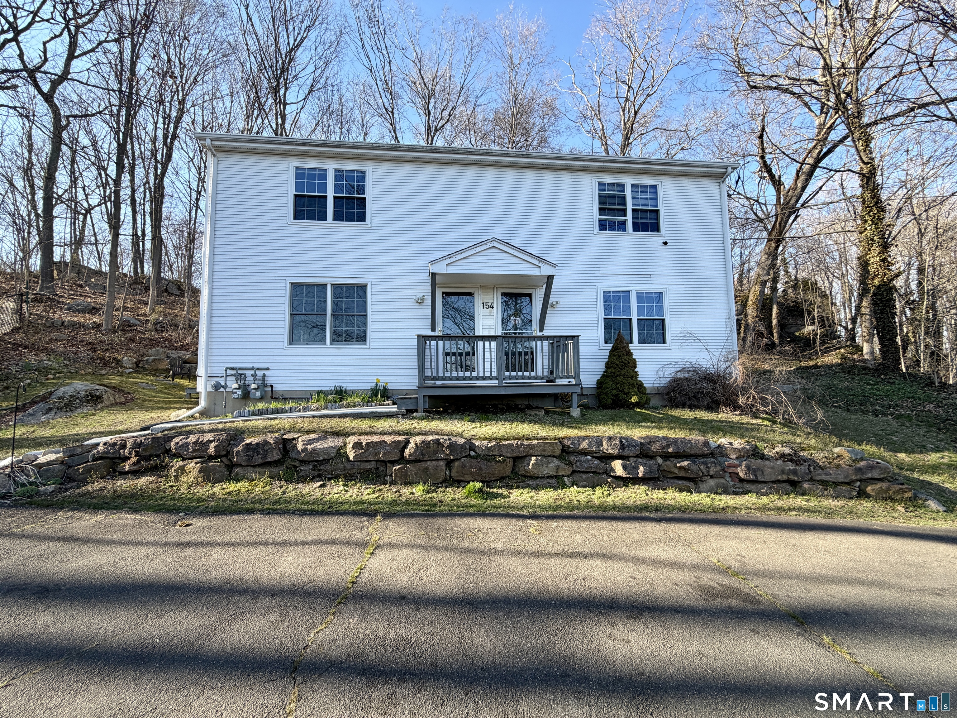 154 East Main Street, Unit A Branford, CT 06405 - Photo 1 of 17 a front view of a house with a yard