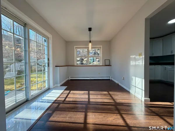 a picture of a living room and a fireplace