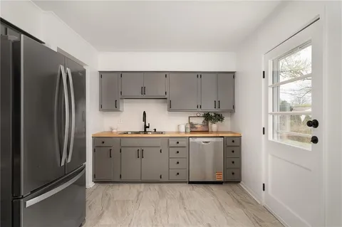 $329,000 | 9920 Benson Drive, Overland Park, KS 66212