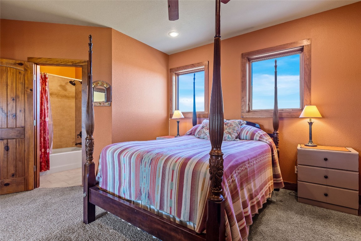 5059 Trainer Wuest Road Blanco, TX 78606 - Photo 18 of 39 a bedroom with a bed and with furniture