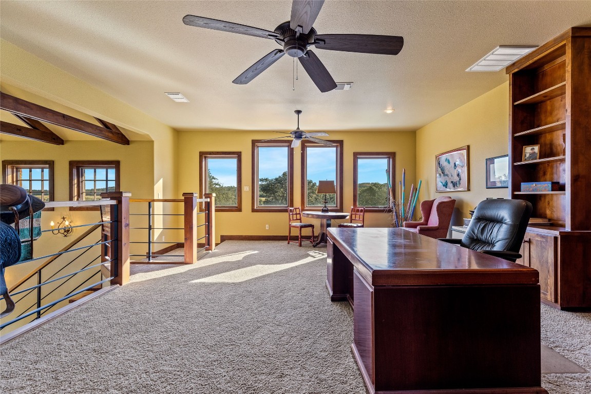 5059 Trainer Wuest Road Blanco, TX 78606 - Photo 20 of 39 a living room with furniture and a flat screen tv