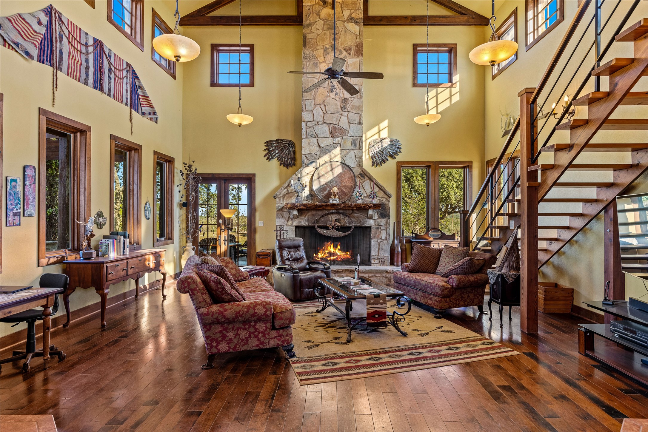 5059 Trainer Wuest Road Blanco, TX 78606 - Photo 5 of 39 a living room with furniture and a fireplace