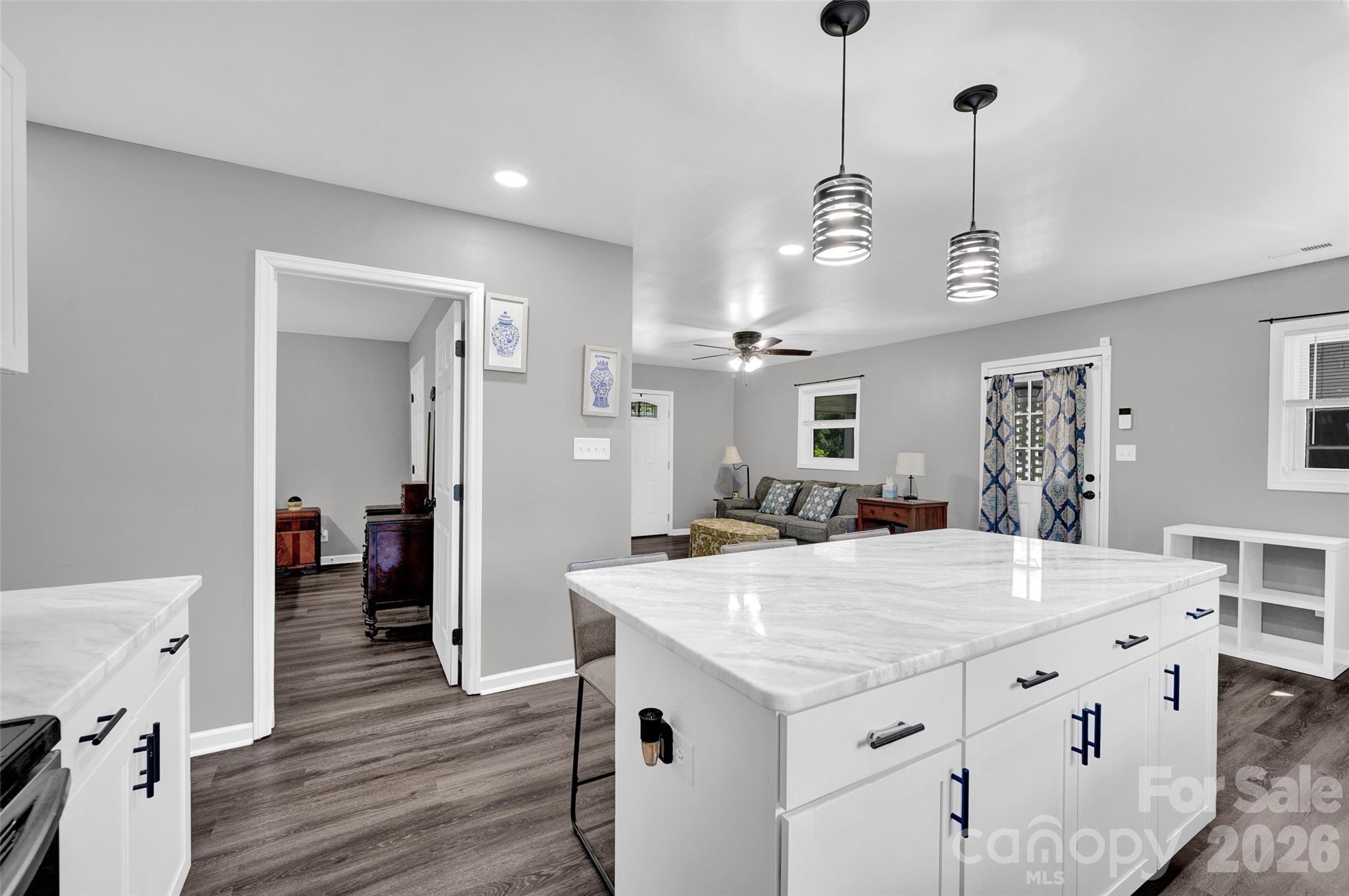 3033 West Highway 10 Conover, NC 28613 - Photo 16 of 26 a view of a kitchen counter space and wooden floor