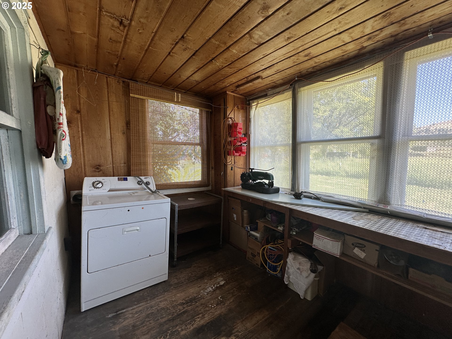 101 First Street Fossil, OR 97830 - Photo 11 of 13 a room with a large window and dryer