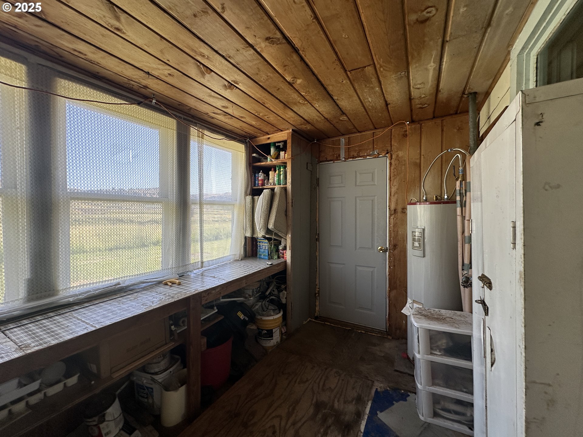 101 First Street Fossil, OR 97830 - Photo 12 of 13 a kitchen with refrigerator and window