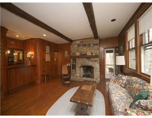 69 St Nicholas Road Darien, CT 06820 - Photo 18 of 20 a living room with furniture and a fireplace