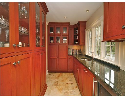 69 St Nicholas Road Darien, CT 06820 - Photo 6 of 20 a kitchen with stainless steel appliances granite countertop a refrigerator and a stove