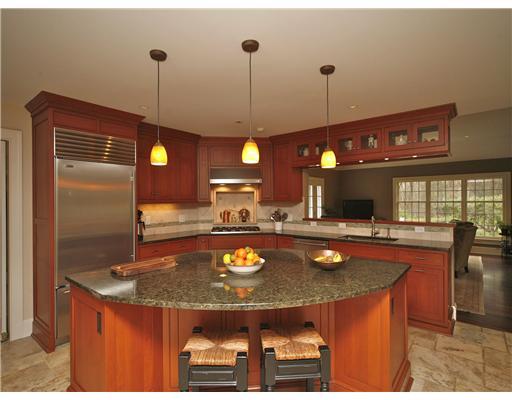 69 St Nicholas Road Darien, CT 06820 - Photo 8 of 20 a kitchen with stainless steel appliances granite countertop a sink a stove and a wooden floors