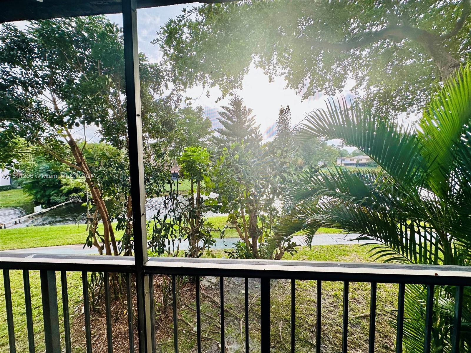 3730 Inverrary Drive, Unit 2P Lauderhill, FL 33319 - Photo 25 of 41 a view of a lake from a balcony