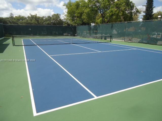 3730 Inverrary Drive, Unit 2P Lauderhill, FL 33319 - Photo 40 of 41 a view of a tennis court