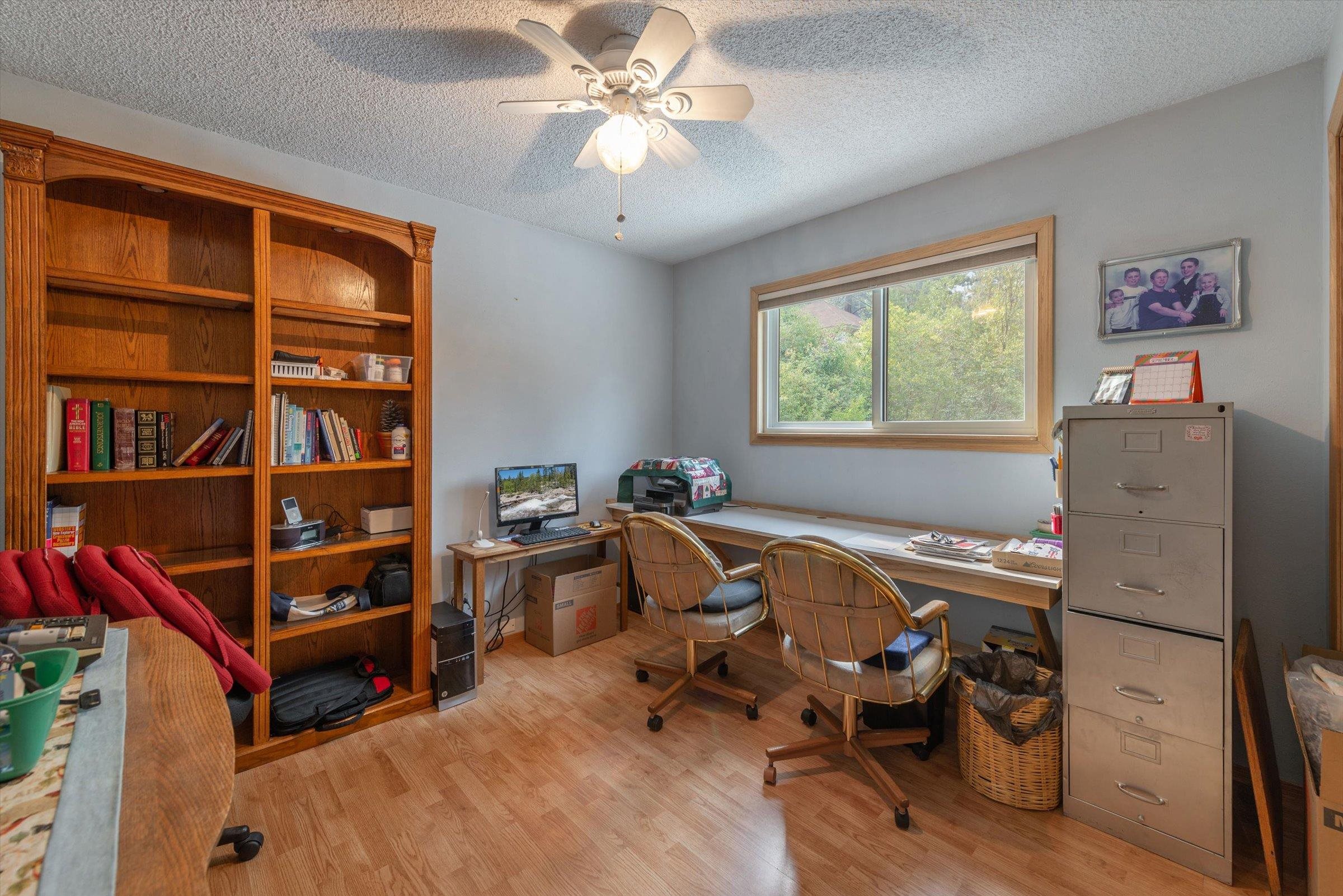 10341 Pine Way Floriston, CA 96111 - Photo 16 of 21 a view of a workspace with furniture and a window