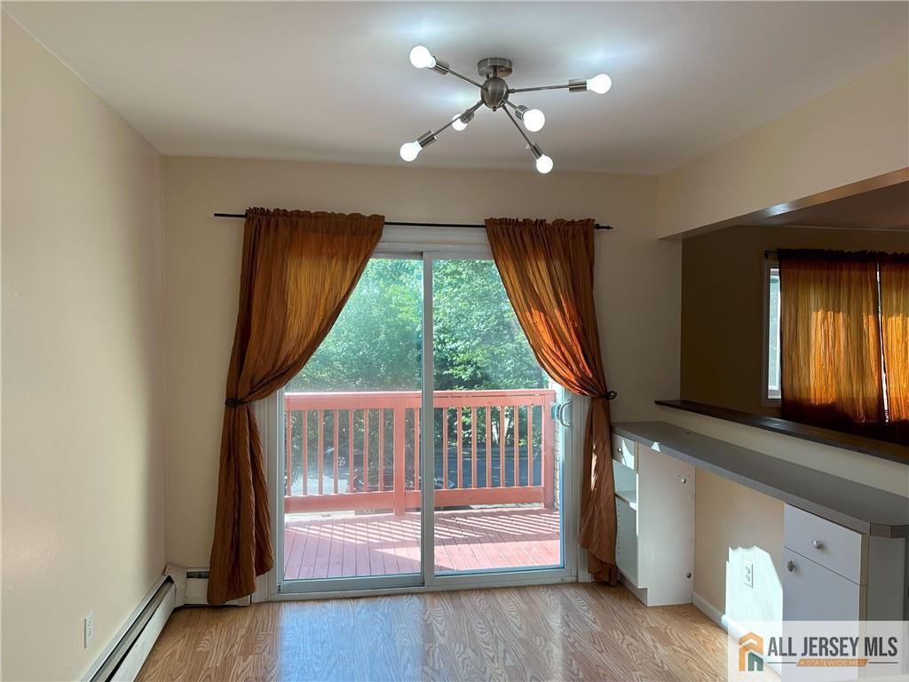 2 Lake Avenue, Unit 7B East Brunswick, NJ 08816 - Photo 4 of 10 a view of entryway with wooden floor