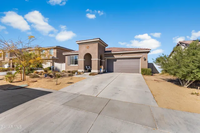 a view of a house with a patio