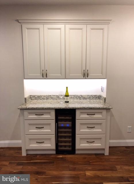 4033 Salem Bottom Road Westminster, MD 21157 - Photo 23 of 30 Wet bar in basement with wine refrigerator