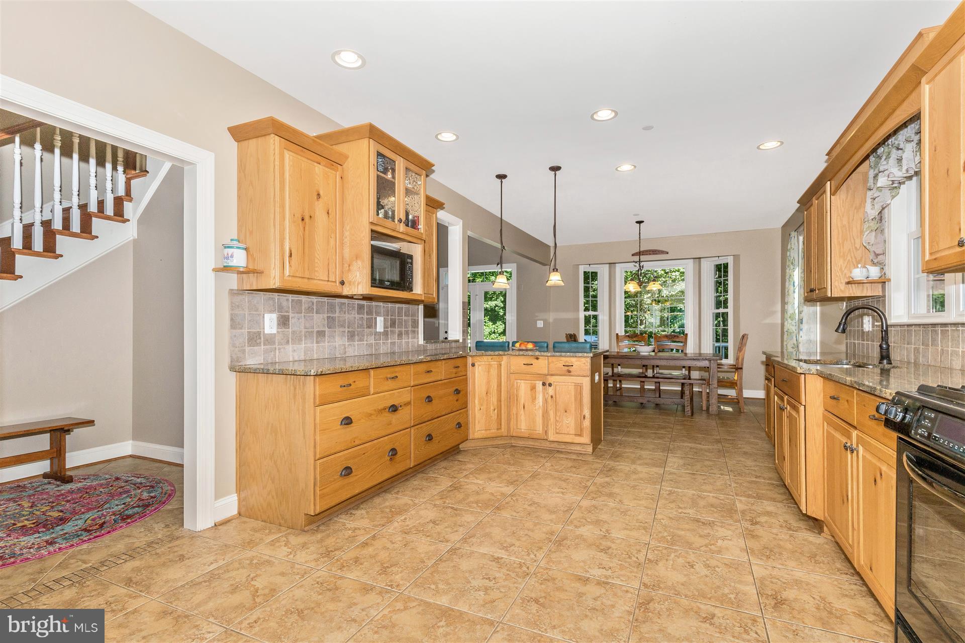4033 Salem Bottom Road Westminster, MD 21157 - Photo 4 of 30 Kitchen with oak cabinets, granite counter tops