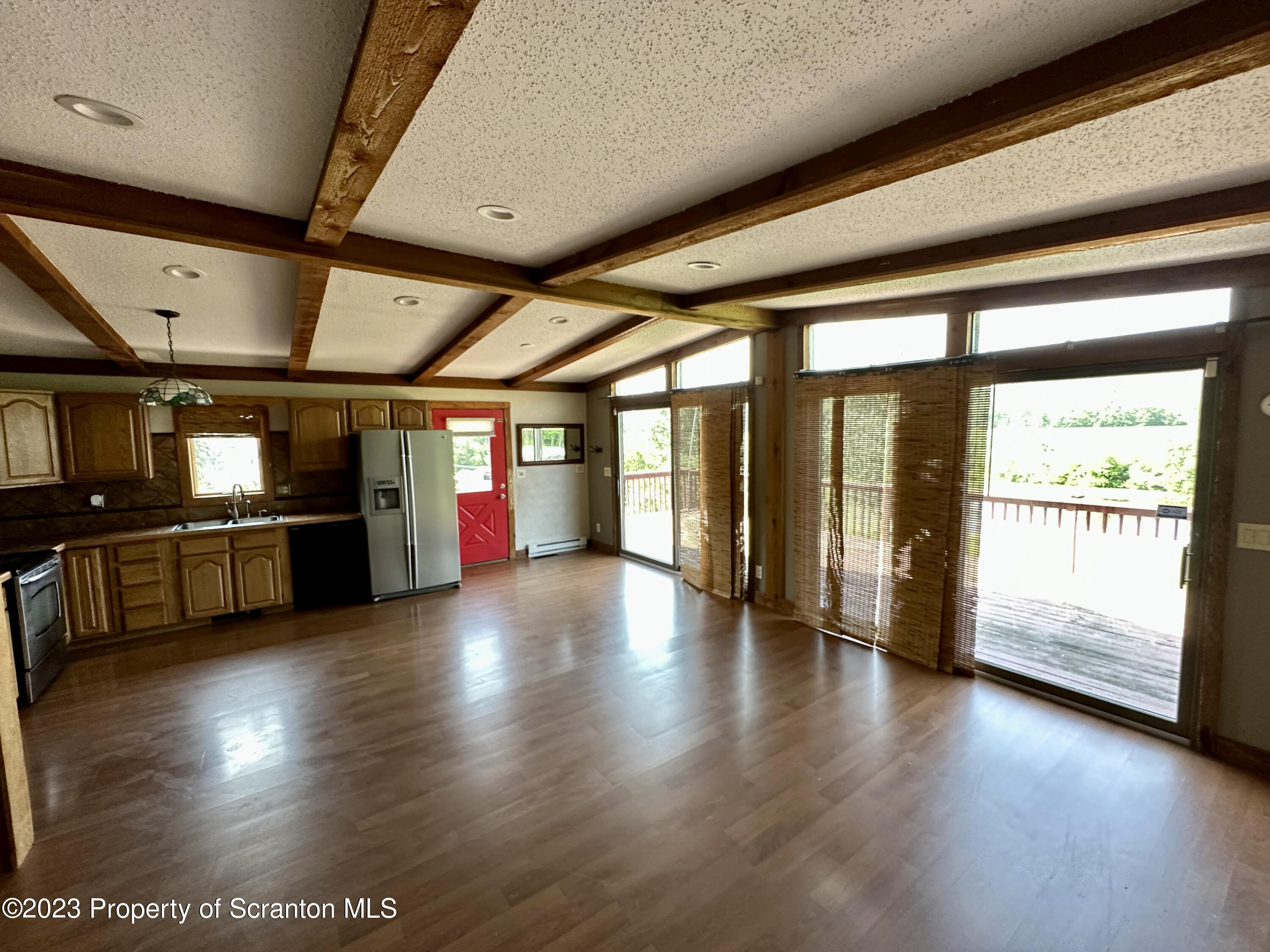 764 Coon Road Wyoming, PA 18644 - Photo 5 of 23 a view of a hall with wooden floor