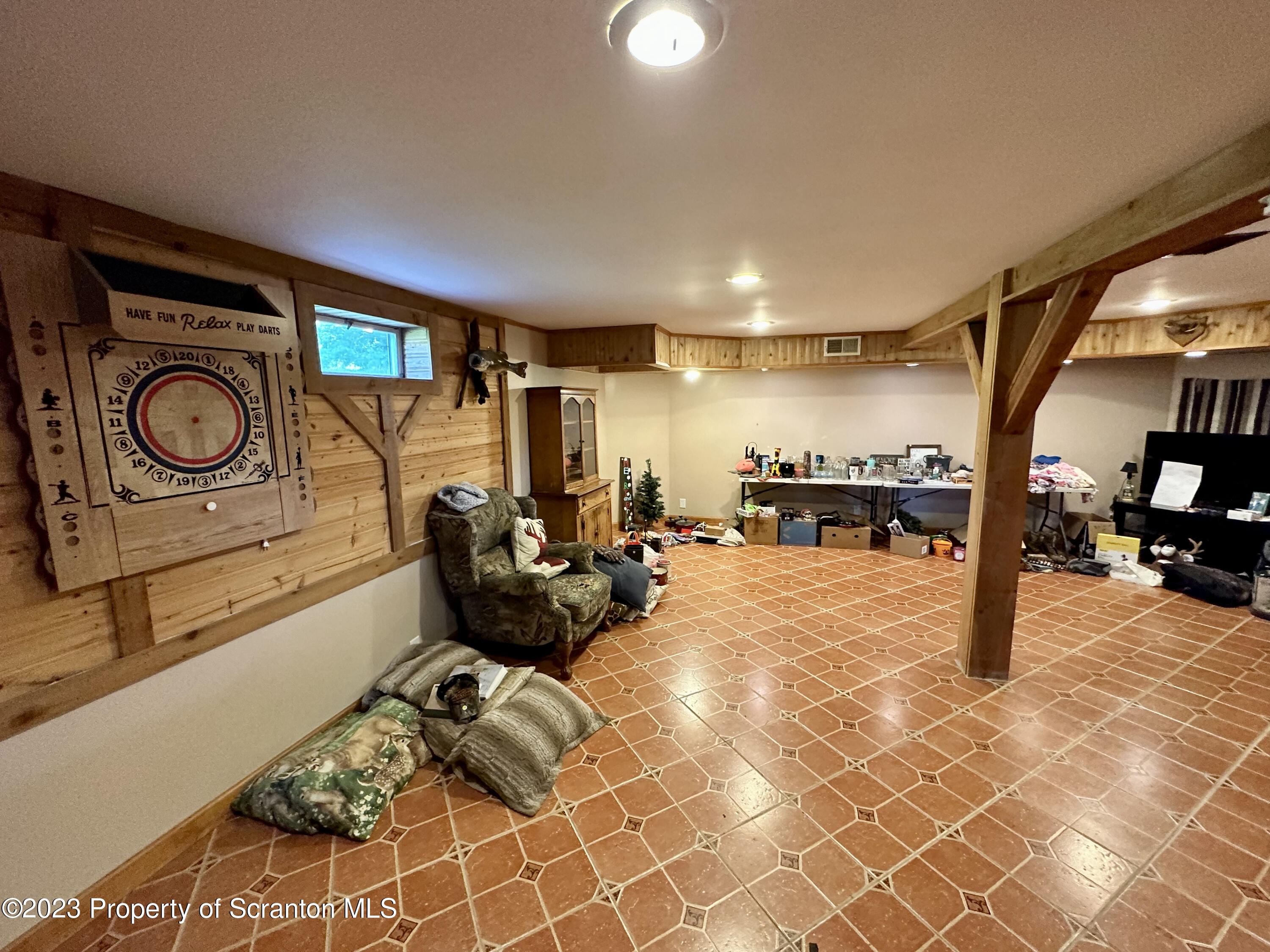 764 Coon Road Wyoming, PA 18644 - Photo 8 of 23 a gym room with lots of chairs and a view of bedroom
