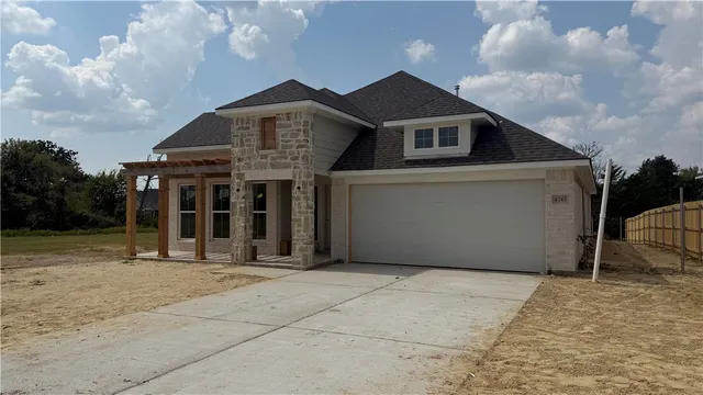 a front view of a house with a porch