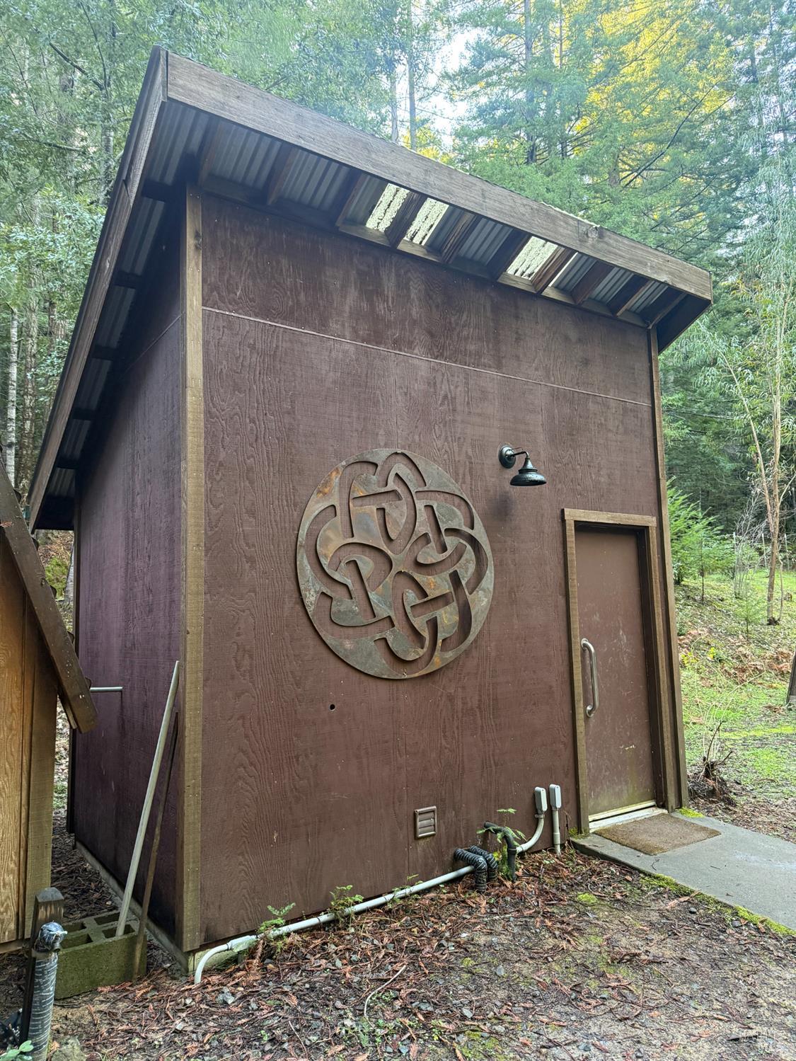 17001 Walker Lake Road Willits, CA 95490 - Photo 17 of 37 a front view of a house with garden