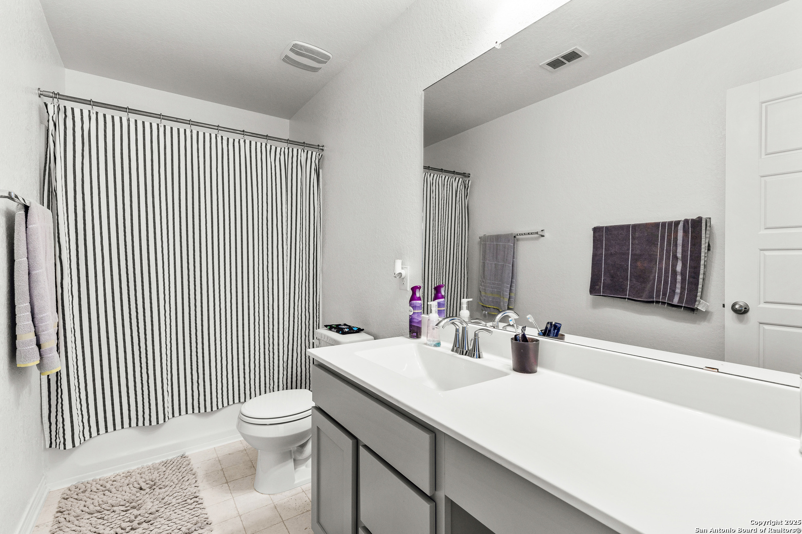 5205 Nature Marion, TX 78124 - Photo 20 of 45 a bathroom with a sink a toilet and shower