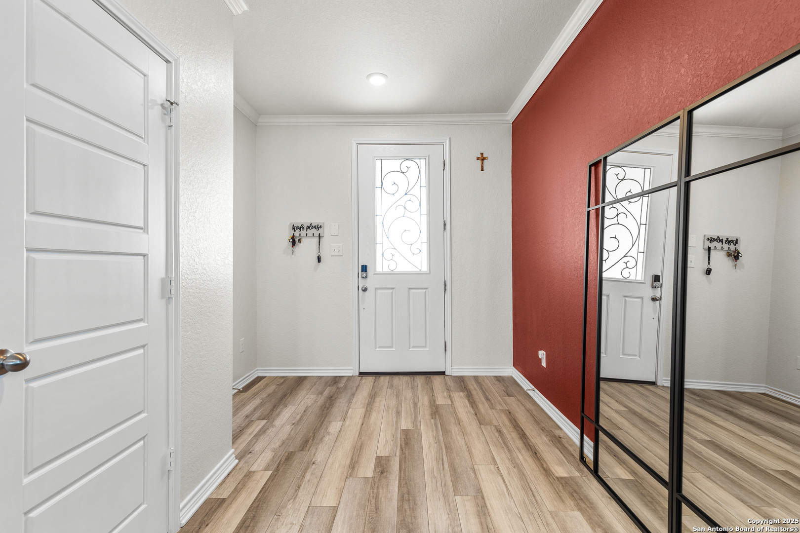 5205 Nature Marion, TX 78124 - Photo 3 of 45 a view of a hallway with wooden floor and closet