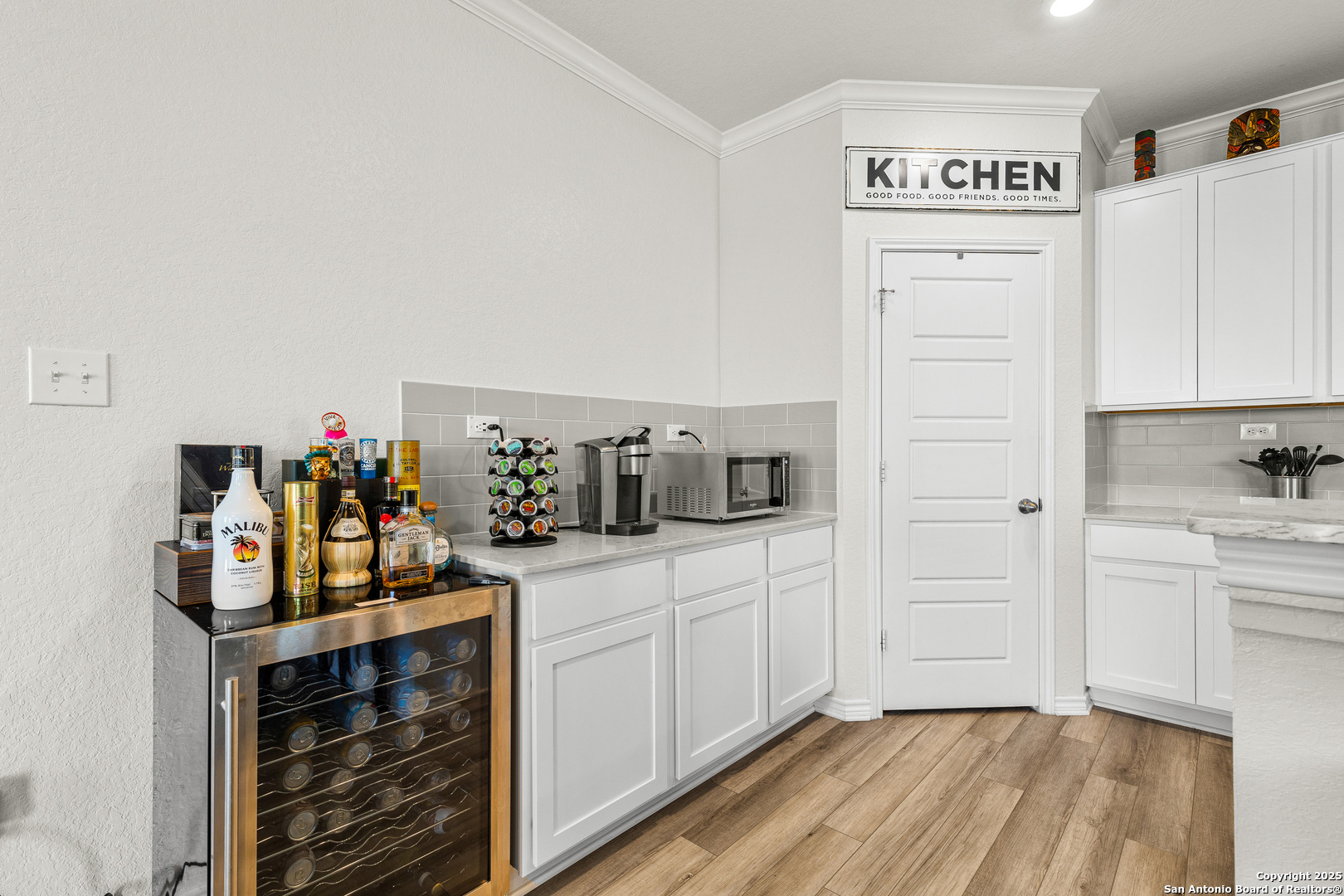 5205 Nature Marion, TX 78124 - Photo 10 of 45 a kitchen with white cabinets and sink