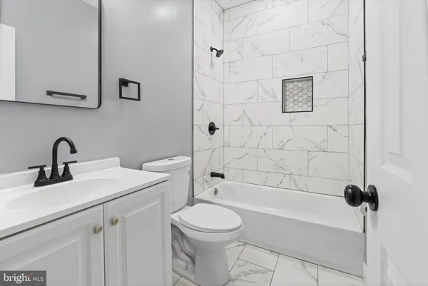 an entryway with a workspace