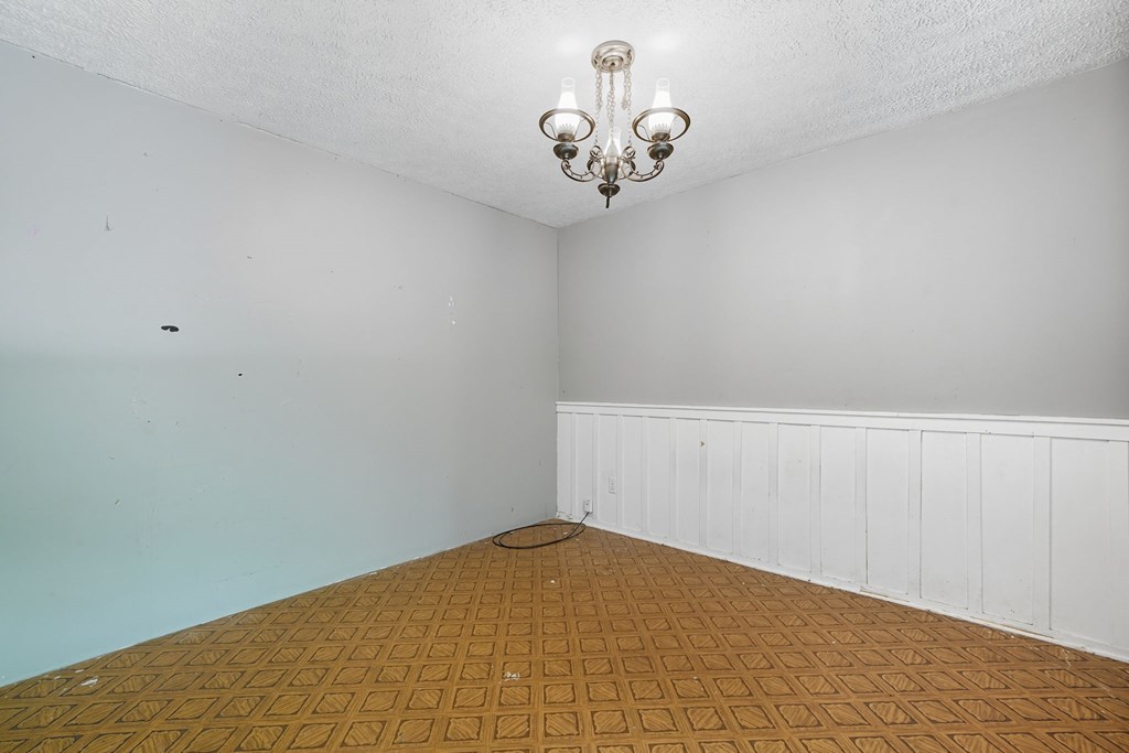 20 Sweetwater Trail Jasper, GA 30143 - Photo 17 of 46 a view of a room with a hanging light and hardwood floor