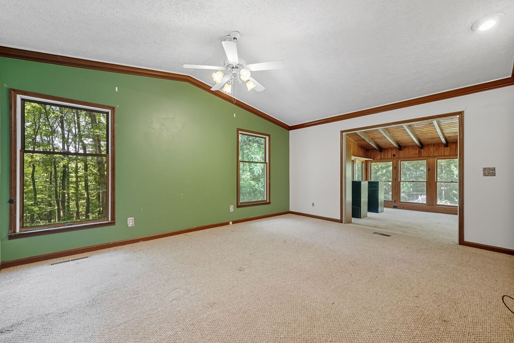 20 Sweetwater Trail Jasper, GA 30143 - Photo 18 of 46 a view of an empty room with window and chandelier