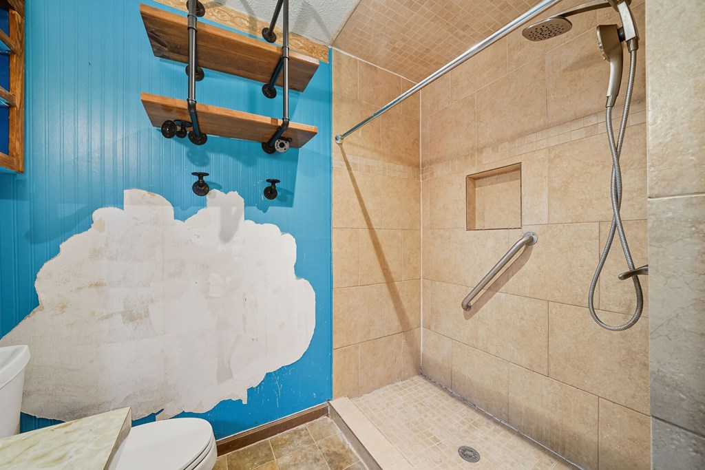 20 Sweetwater Trail Jasper, GA 30143 - Photo 21 of 46 a bathroom with a sink and a shower