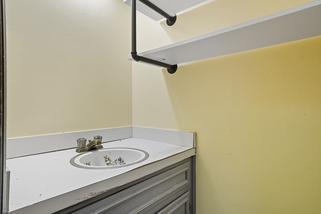 20 Sweetwater Trail Jasper, GA 30143 - Photo 25 of 46 a bathroom with a sink and a mirror