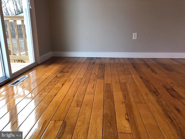 4355 Ridge Road Mount Airy, MD 21771 - Photo 13 of 54 a view of wooden floor in a room