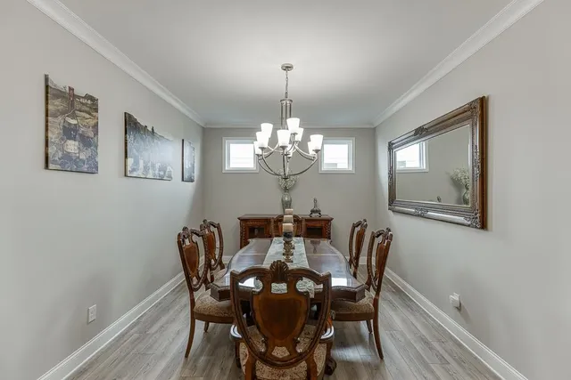 a view of a backyard with sitting area