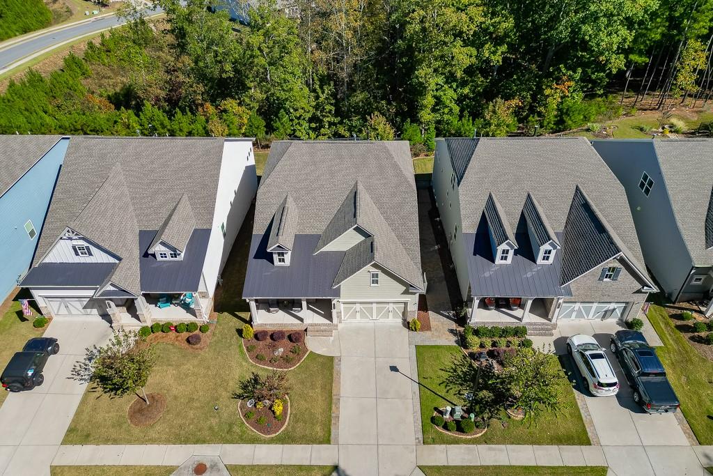 5188 Watchmans Cove Gainesville, GA 30504 - Photo 3 of 90 an aerial view of residential houses with outdoor space and trees