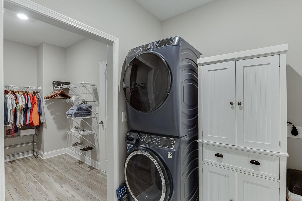5188 Watchmans Cove Gainesville, GA 30504 - Photo 34 of 90 a view of a storage & utility room with washer and dryer