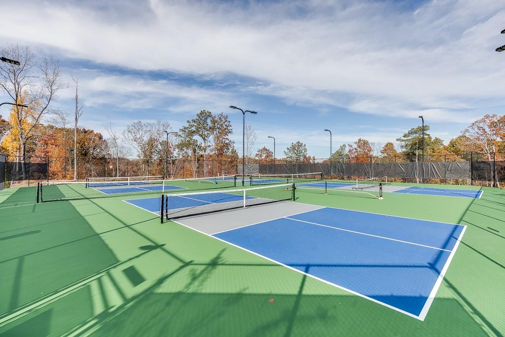5188 Watchmans Cove Gainesville, GA 30504 - Photo 77 of 90 a view of an outdoor space and tennis court