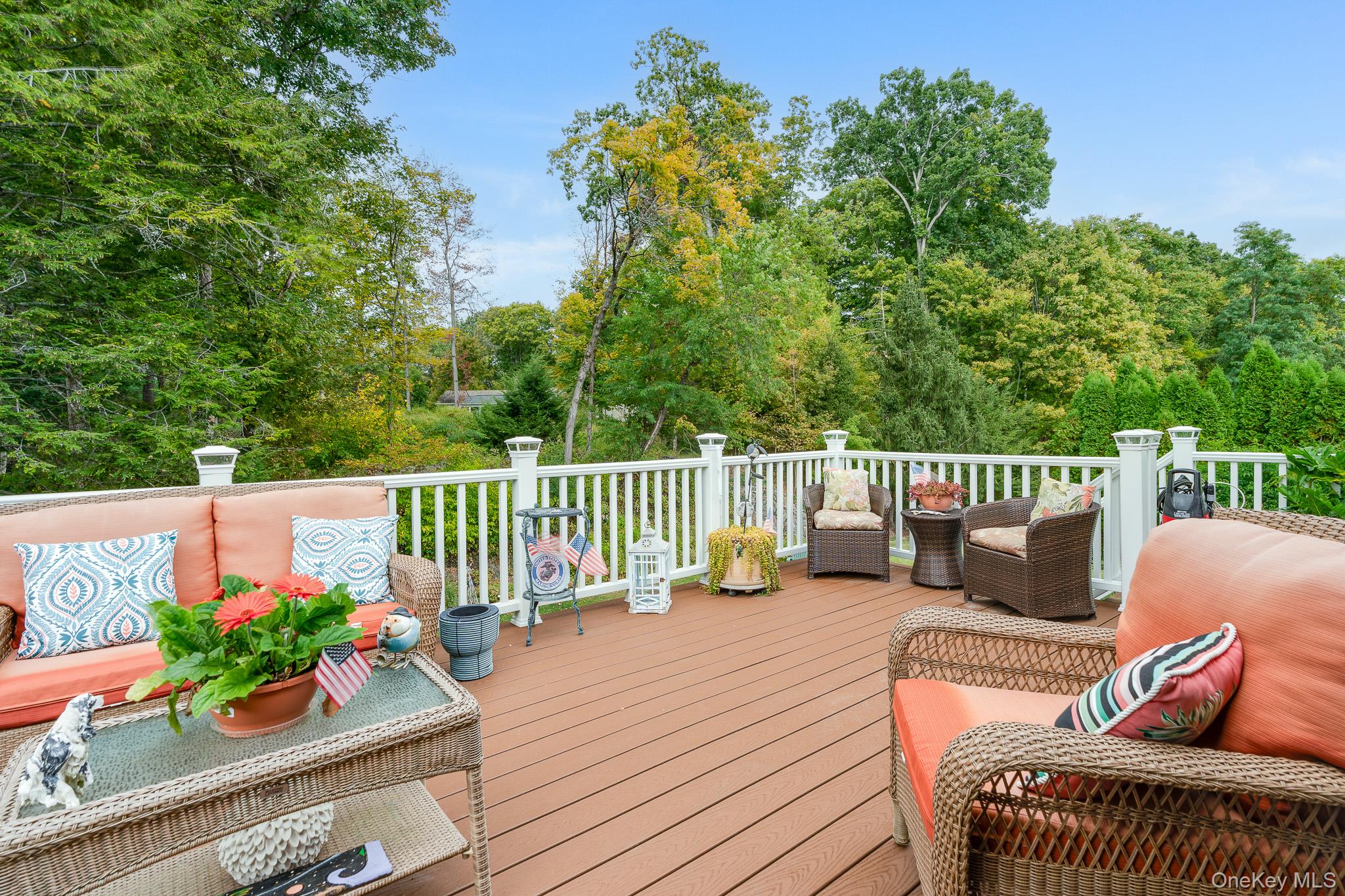 34 Raker Road Poughkeepsie, NY 12603 - Photo 24 of 27 a view of a deck with couches wooden floor and fence