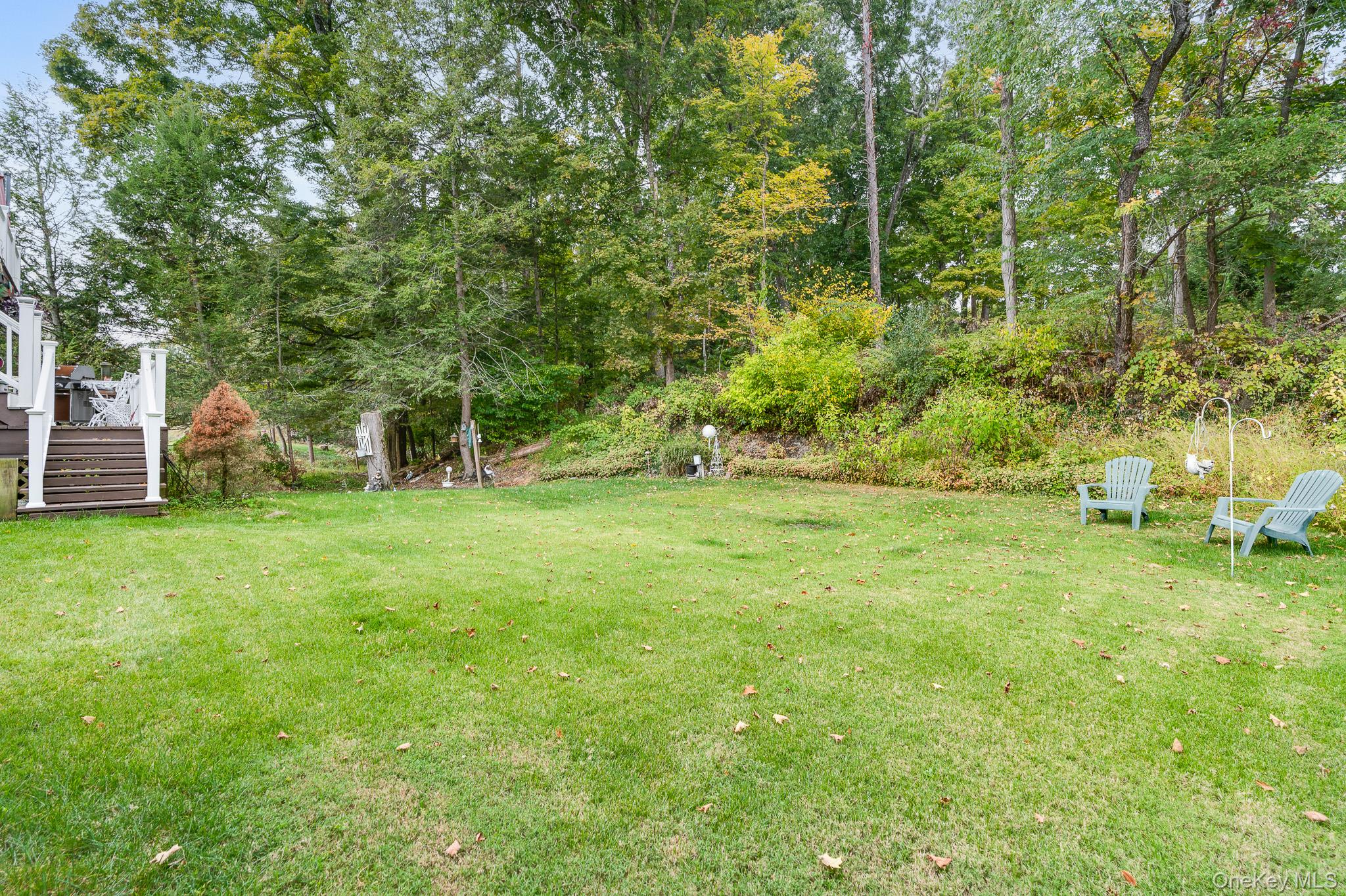34 Raker Road Poughkeepsie, NY 12603 - Photo 25 of 27 a backyard of a house with lots of green space