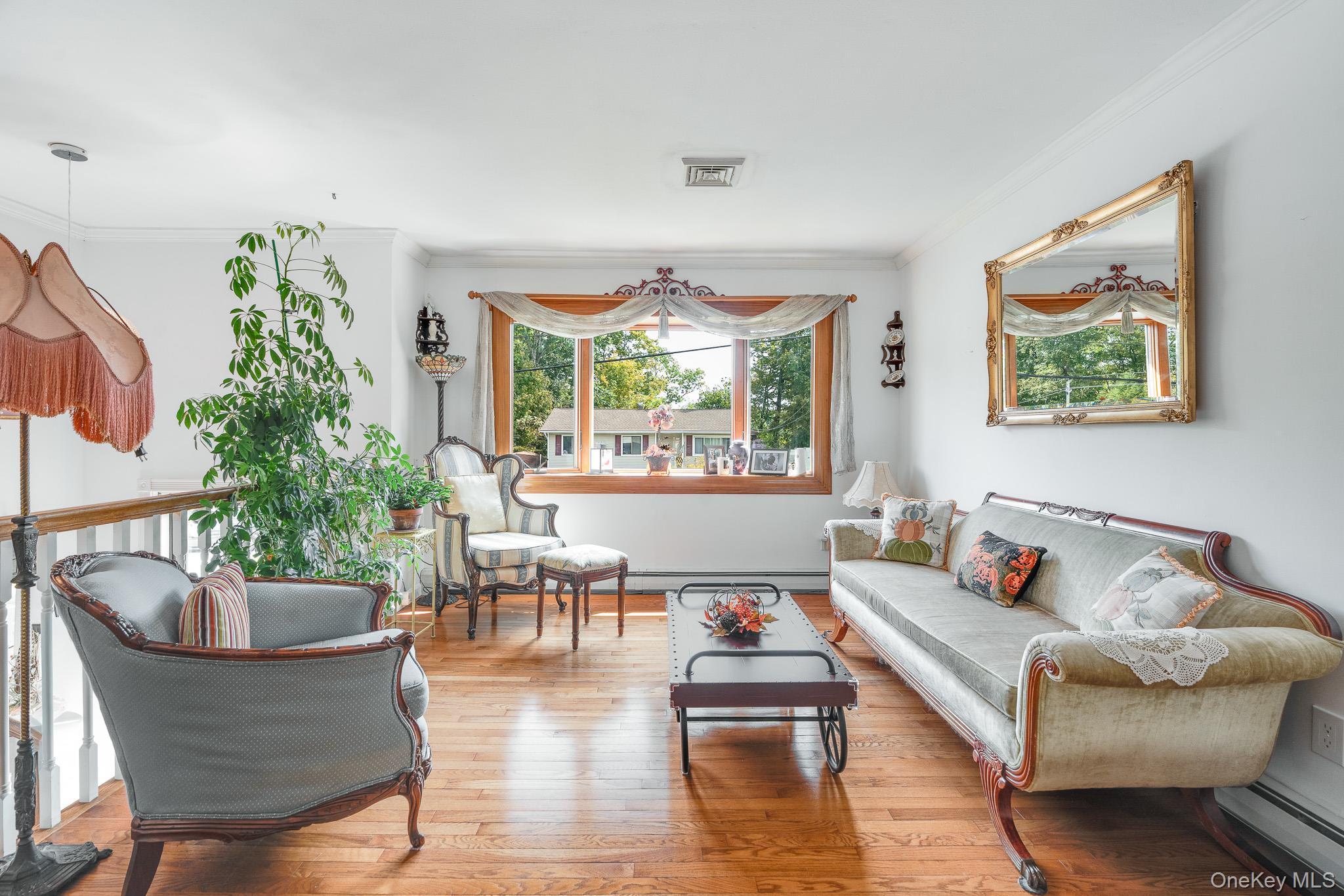 34 Raker Road Poughkeepsie, NY 12603 - Photo 3 of 27 a living room with furniture and a large window