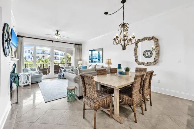 a kitchen with stainless steel appliances kitchen island granite countertop a refrigerator and a stove top oven