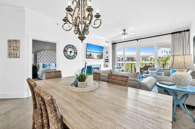 a kitchen with stainless steel appliances granite countertop a stove refrigerator sink and cabinets