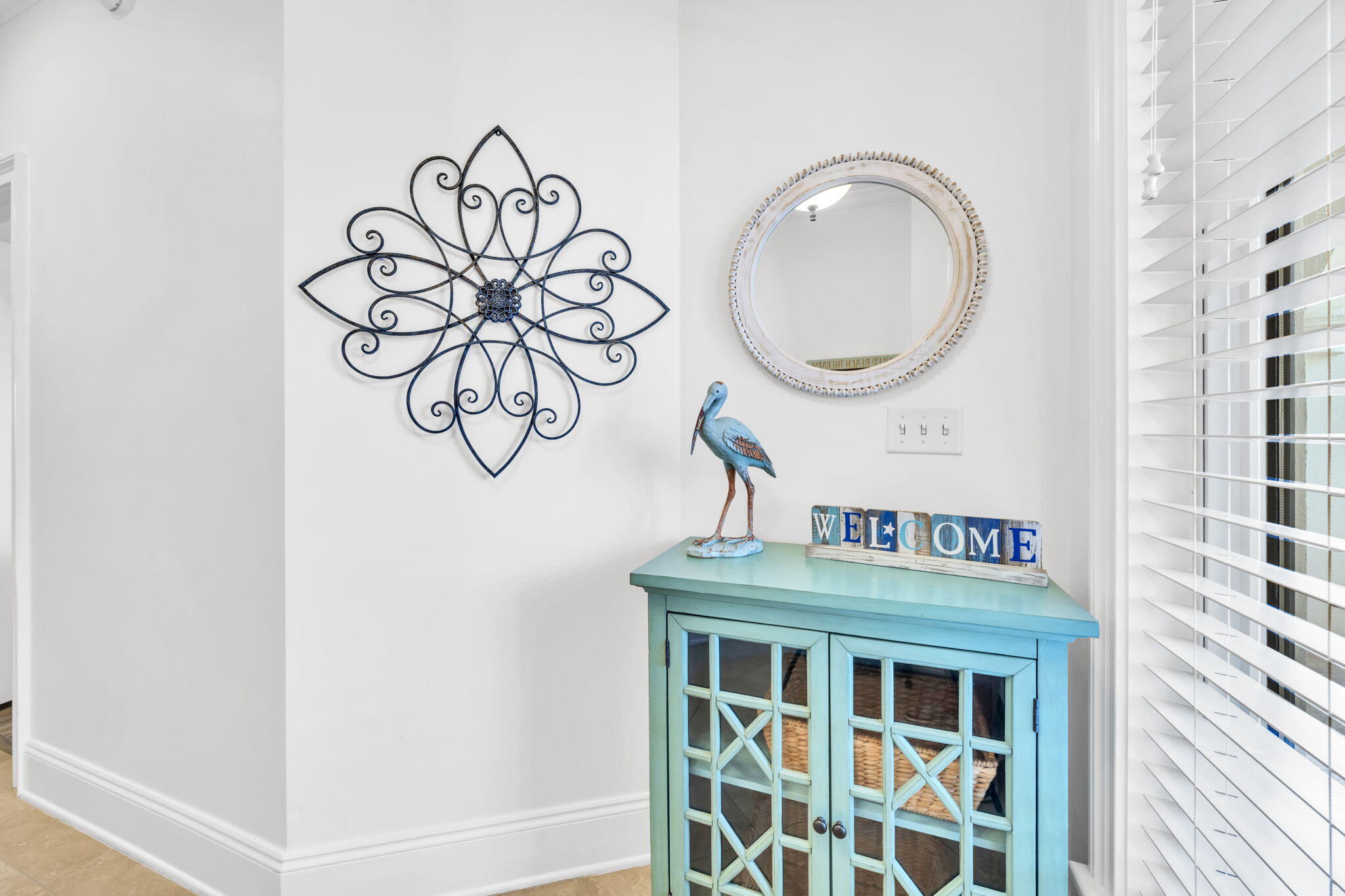 2421 West County Highway 30A, Unit F304 Santa Rosa Beach, FL 32459 - Photo 2 of 63 a bathroom with a sink and a mirror