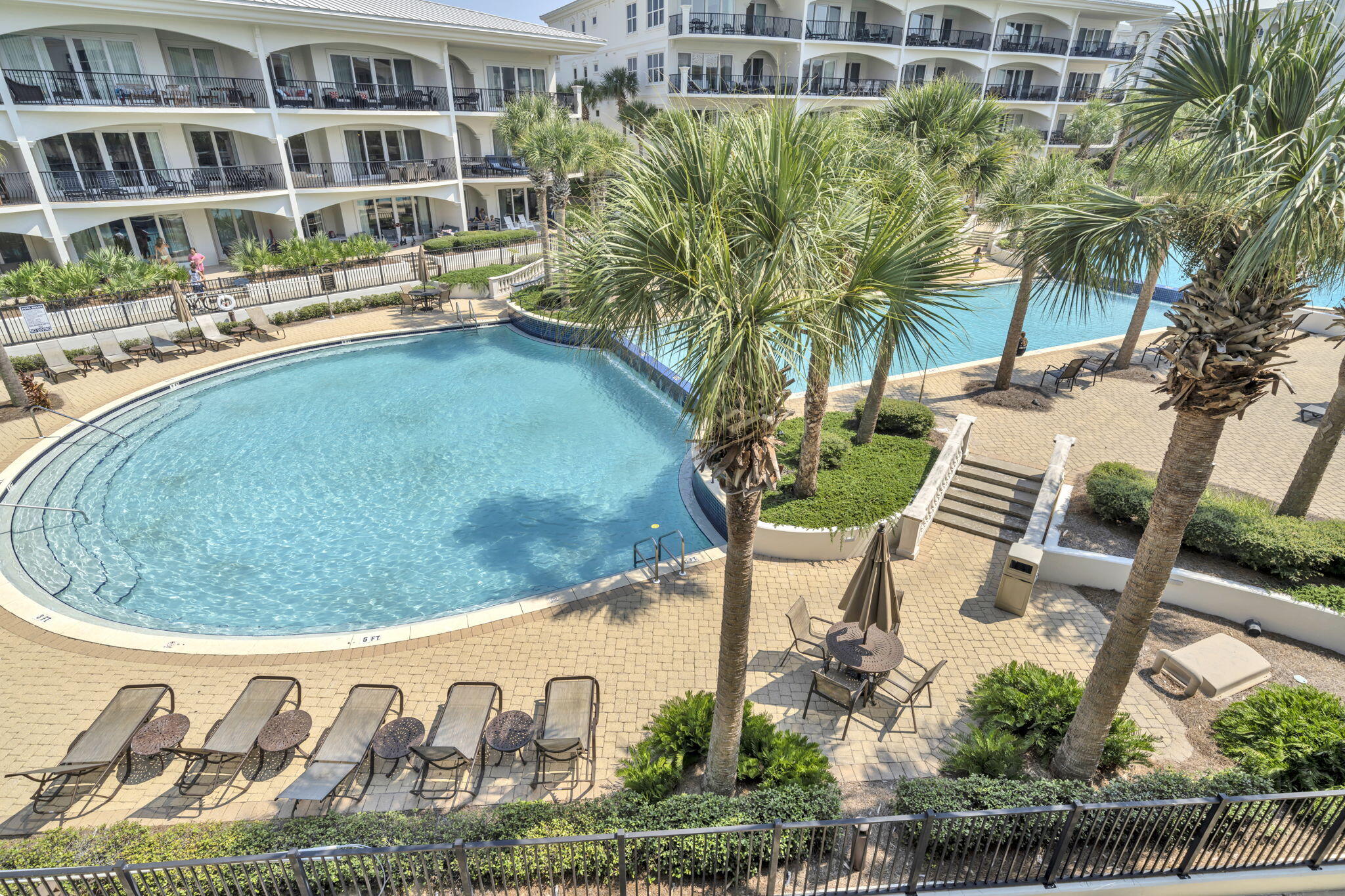 2421 West County Highway 30A, Unit F304 Santa Rosa Beach, FL 32459 - Photo 40 of 63 a view of swimming pool with outdoor seating and plants