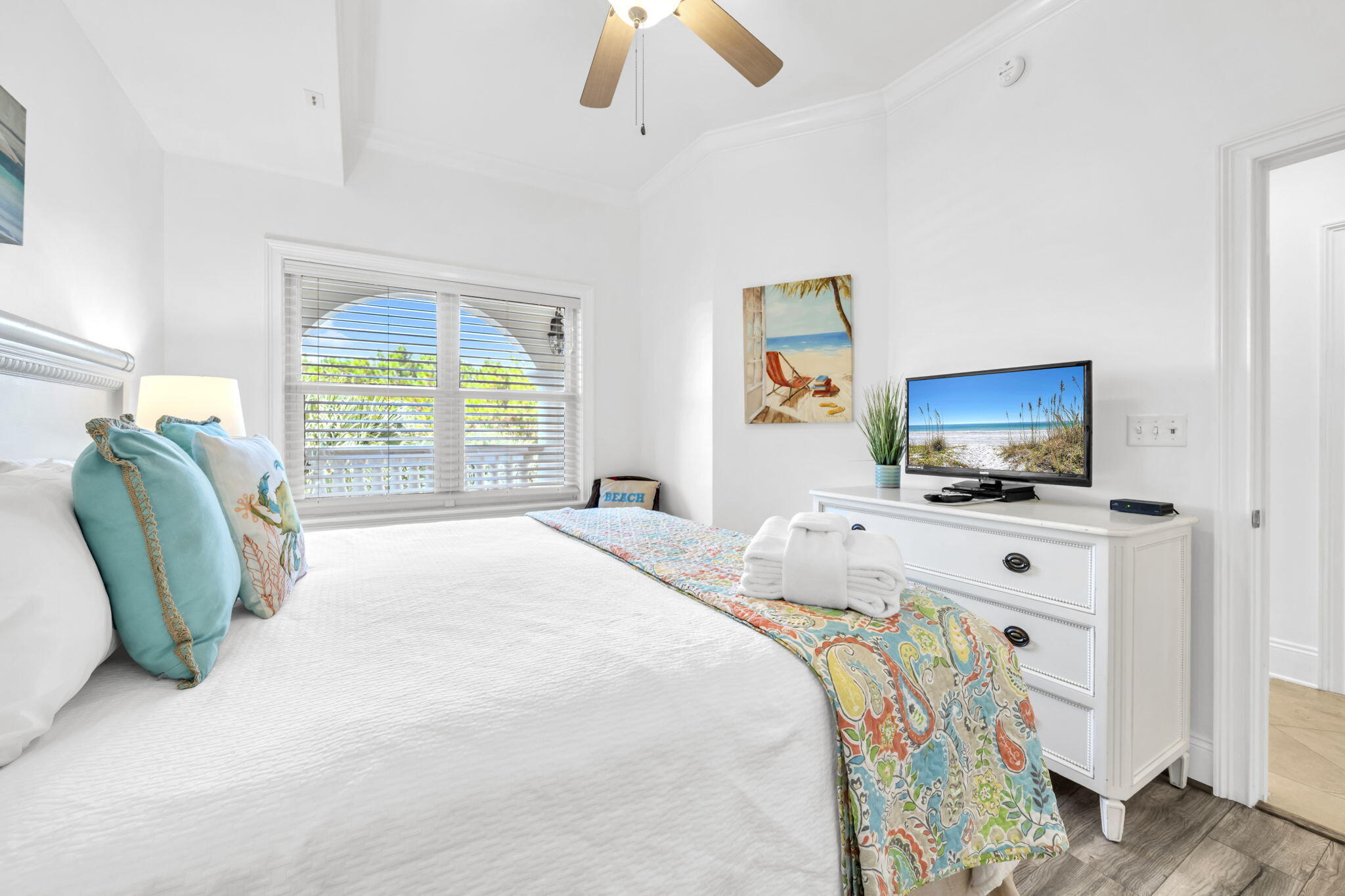 2421 West County Highway 30A, Unit F304 Santa Rosa Beach, FL 32459 - Photo 4 of 63 a bedroom with bed and flat screen tv