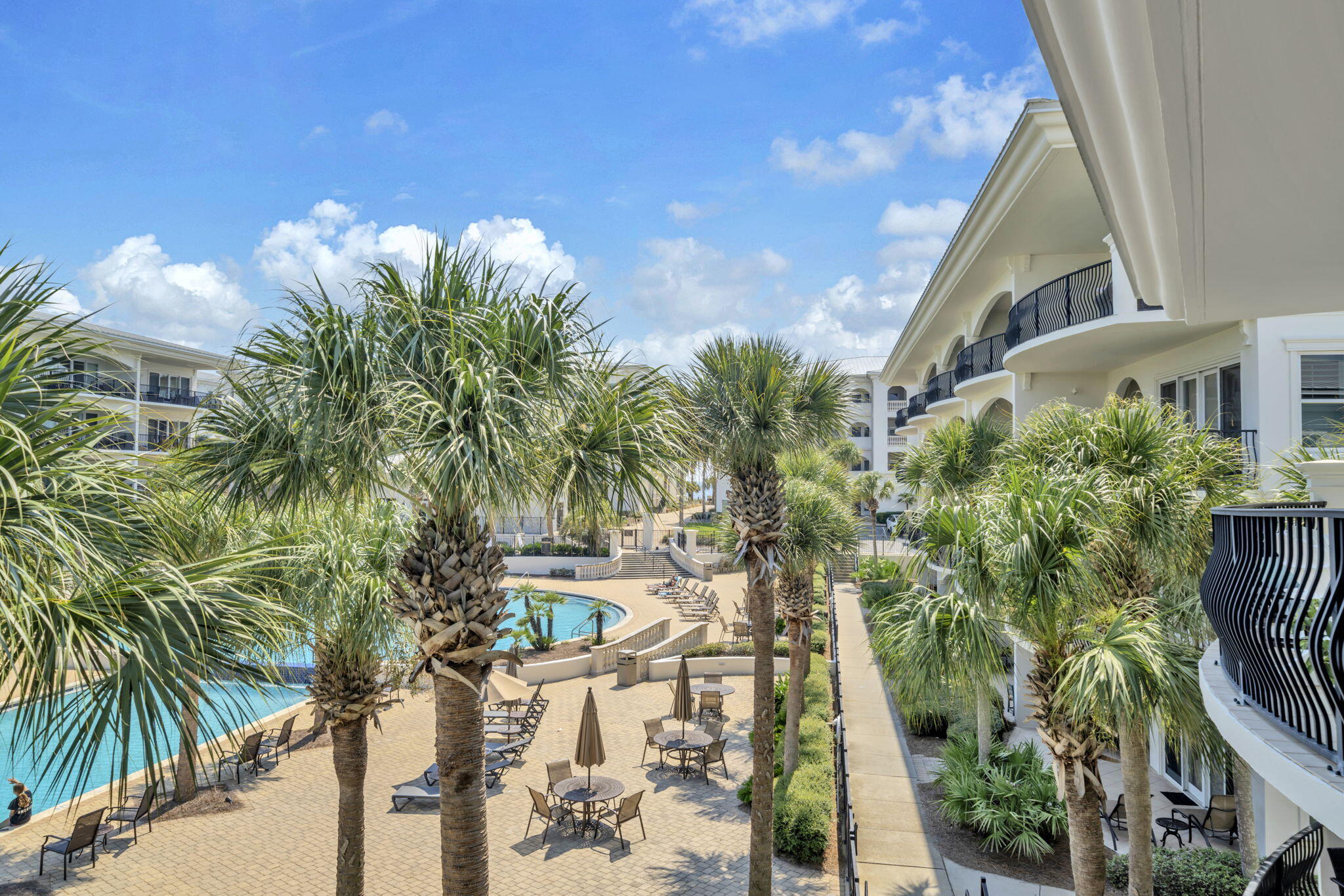 2421 West County Highway 30A, Unit F304 Santa Rosa Beach, FL 32459 - Photo 41 of 63 a backyard of a house with lots of green space